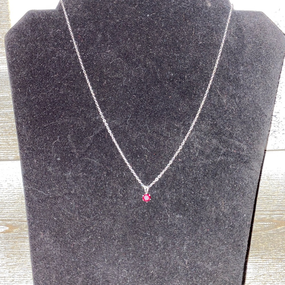Silver necklace with red stone